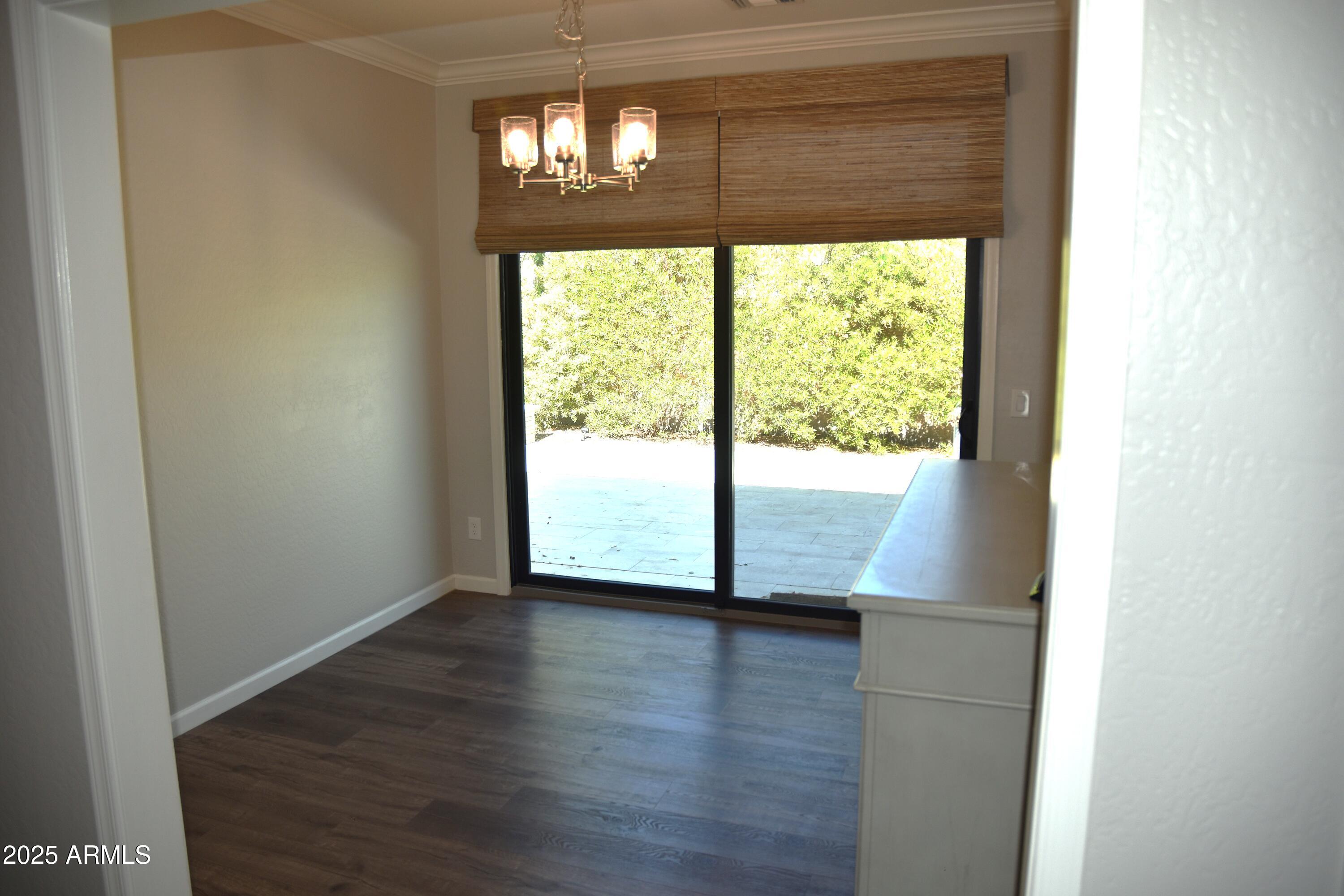 963 South Colonial Drive Gilbert, AZ 85296 - Photo 13 of 29 Dining/ Den out to Yard