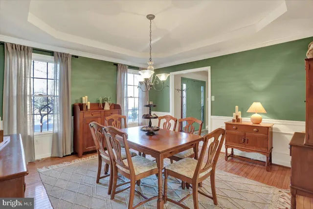 a kitchen with stainless steel appliances kitchen island granite countertop a sink and cabinets