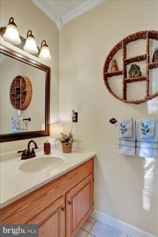 a view of a livingroom with furniture staircase and kitchen view
