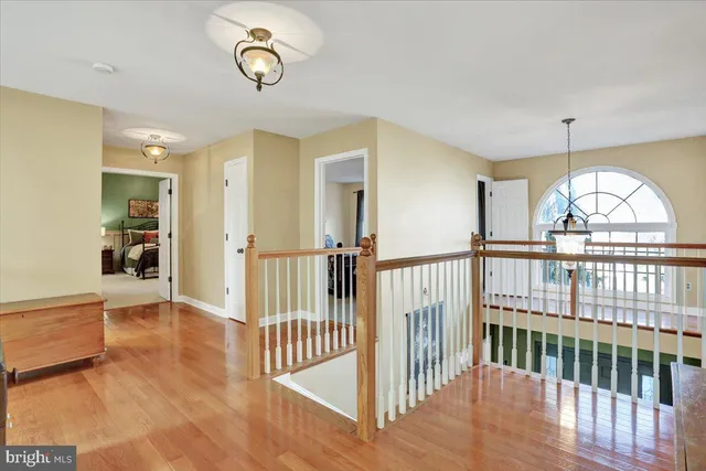 a view of a bedroom from a hallway
