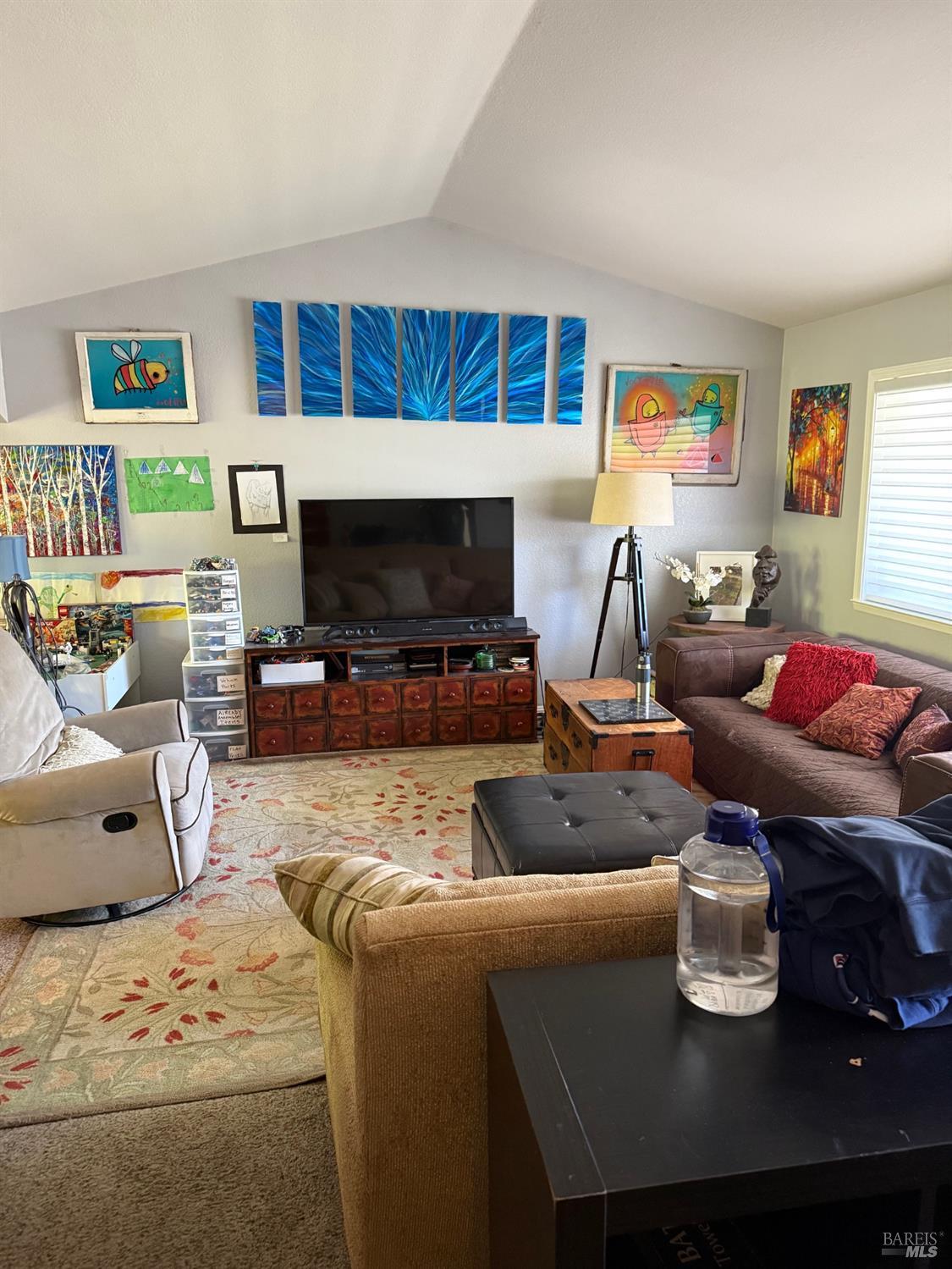 2813 Beth Court Santa Rosa, CA 95403 - Photo 3 of 24 a living room with furniture and a flat screen tv