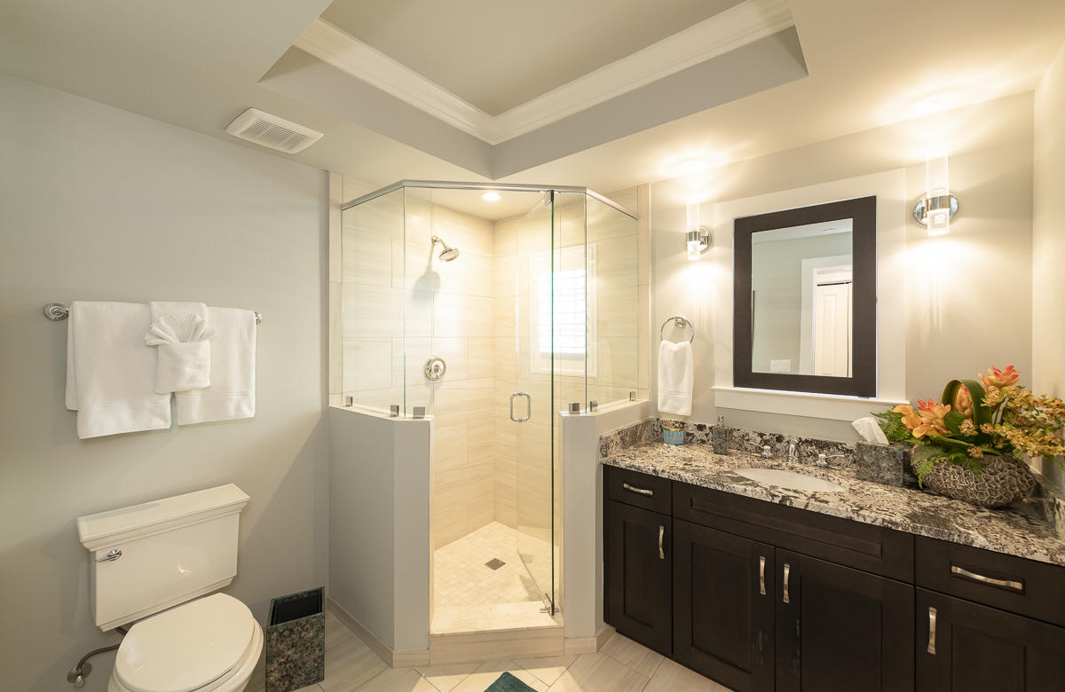 139 Simonton Street Key West, FL 33040 - Photo 19 of 68 a bathroom with a granite countertop sink toilet and shower