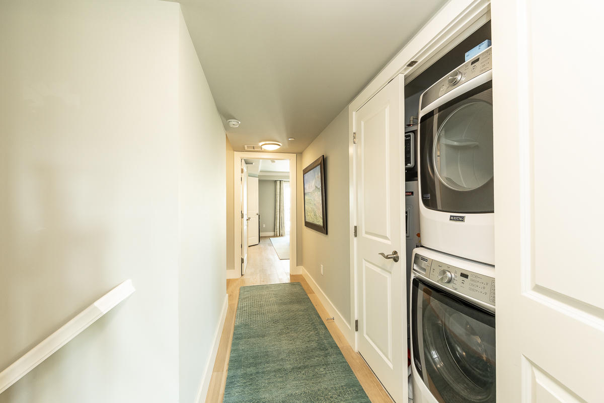 139 Simonton Street Key West, FL 33040 - Photo 29 of 68 a view of a hallway with washer and dryer