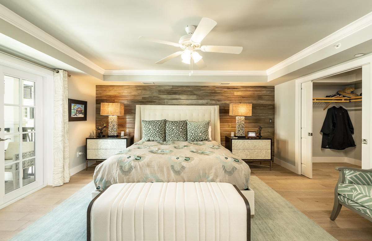 139 Simonton Street Key West, FL 33040 - Photo 34 of 68 a bedroom with a bed and walk in closet