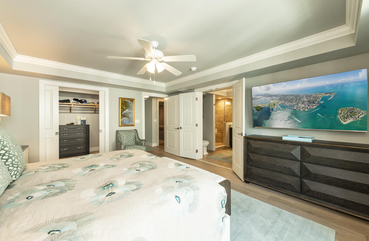 139 Simonton Street Key West, FL 33040 - Photo 35 of 68 a view of a bedroom with furniture and window