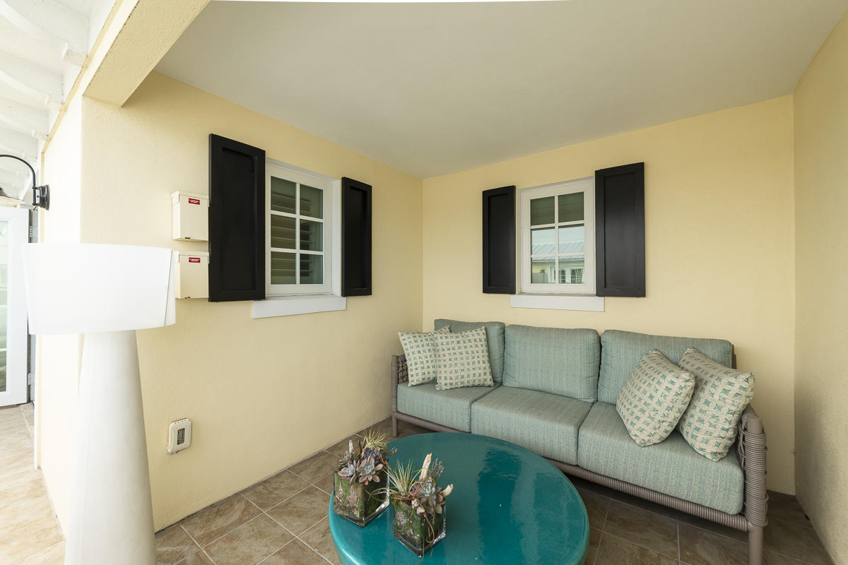 139 Simonton Street Key West, FL 33040 - Photo 53 of 68 a living room with furniture and a window