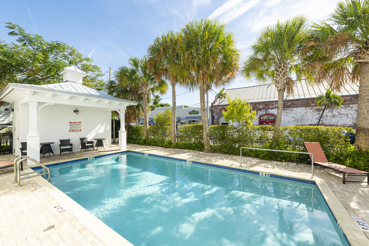 139 Simonton Street Key West, FL 33040 - Photo 56 of 68 a view of a swimming pool with a patio