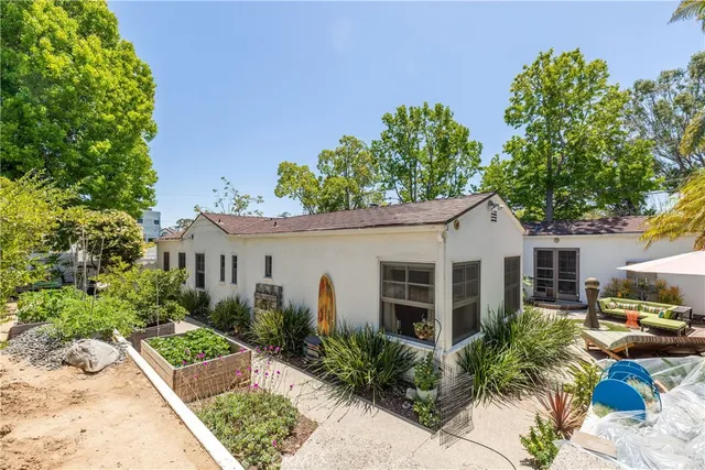 a view of a backyard of the house