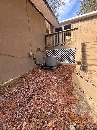 a view of a backyard with sitting area
