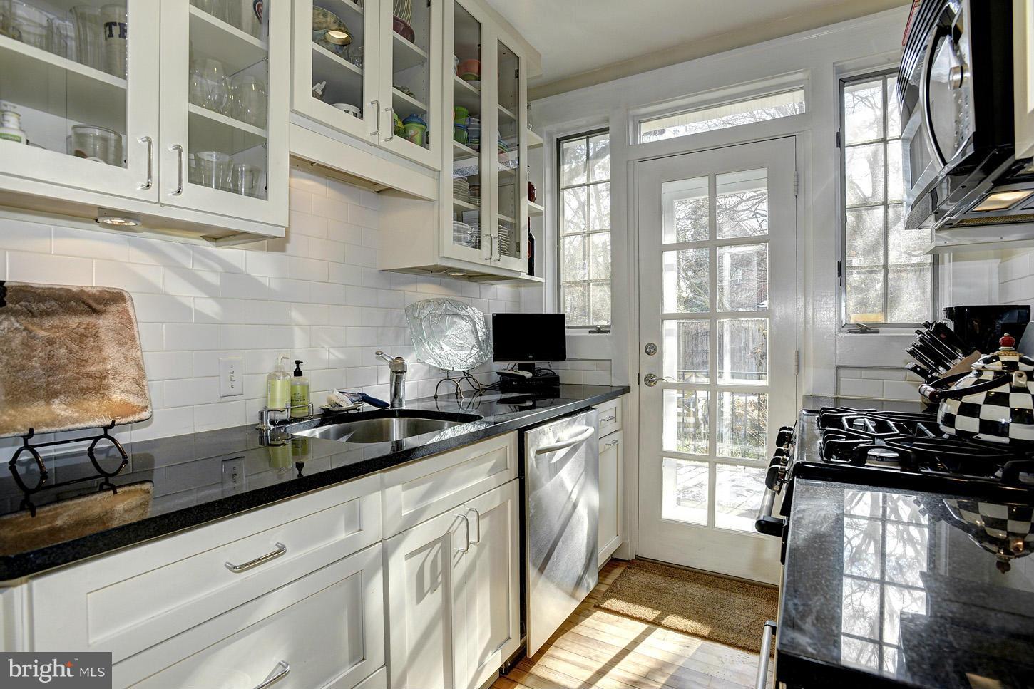 4458 Reservoir Road Northwest Washington, DC 20007 - Photo 8 of 27 Galley Kitchen to Rear Garden
