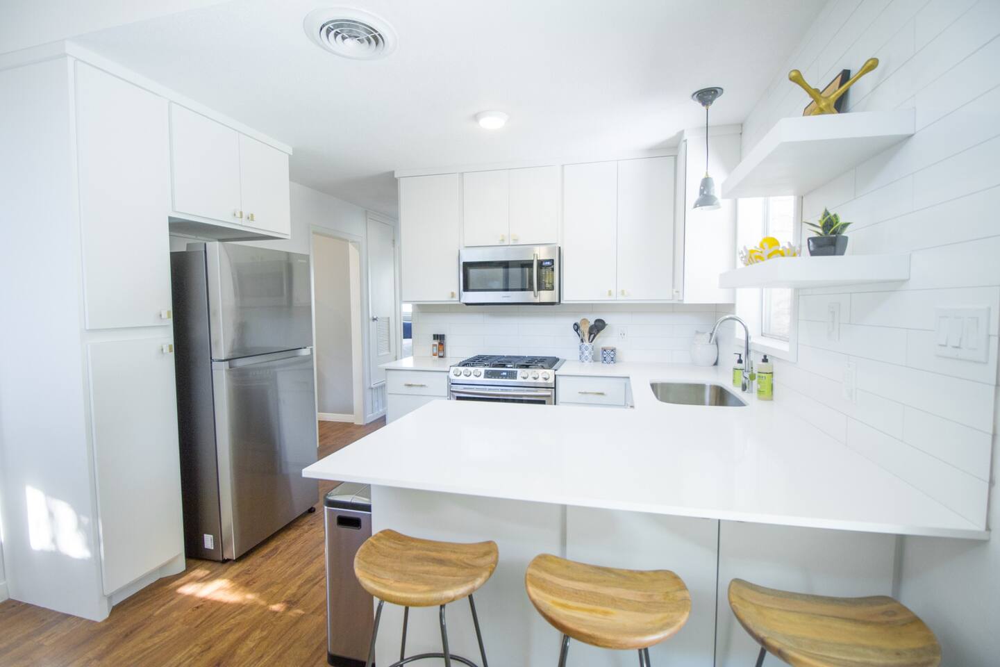 1913 Rabb Road, Unit B Austin, TX 78704 - Photo 3 of 10 A well-appointed kitchen showcasing contemporary stainless steel appliances and crisp white cabinetry.