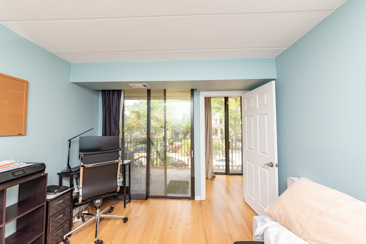 651 West Sheridan Road, Unit 2B Chicago, IL 60613 - Photo 12 of 16 a view of a workspace with furniture and a window