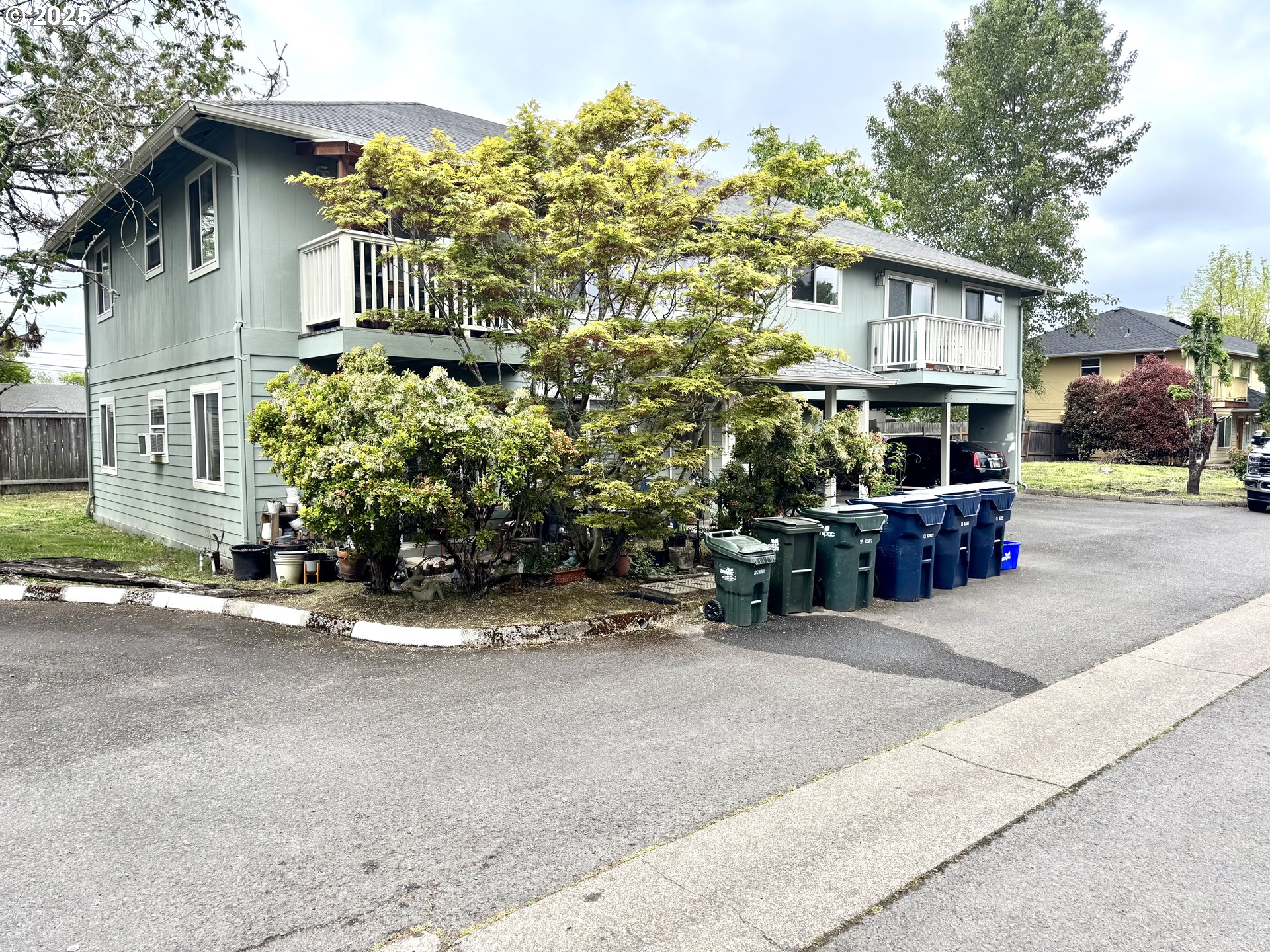 1652 West Broadway Eugene, OR 97402 - Photo 3 of 4 front view of a house with a street