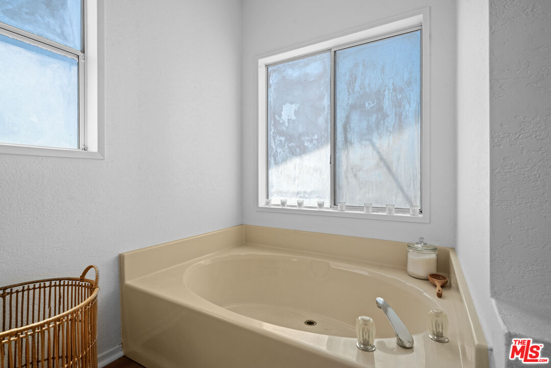 1794 Rebel Road Acton, CA 93551 - Photo 18 of 36 a white bath tub sitting next to a window