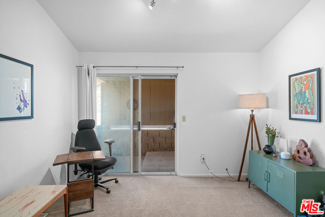 1794 Rebel Road Acton, CA 93551 - Photo 19 of 36 a room with a window and furniture