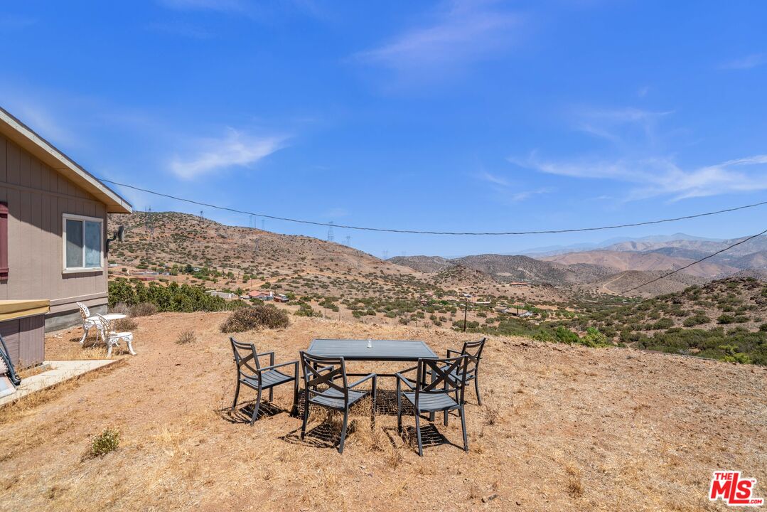 1794 Rebel Road Acton, CA 93551 - Photo 32 of 36 a view of a terrace with furniture and city view