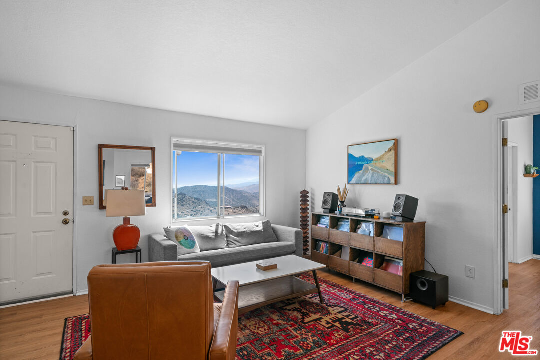 1794 Rebel Road Acton, CA 93551 - Photo 4 of 36 a living room with furniture a rug and a window