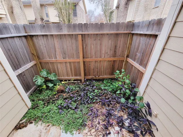 a garden has wooden fence