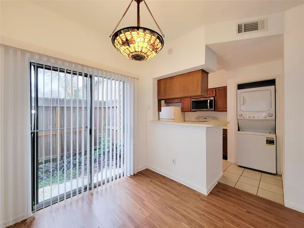 a very nice looking kitchen with a large window