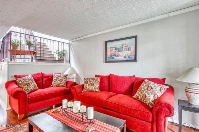 a living room with furniture and a couch