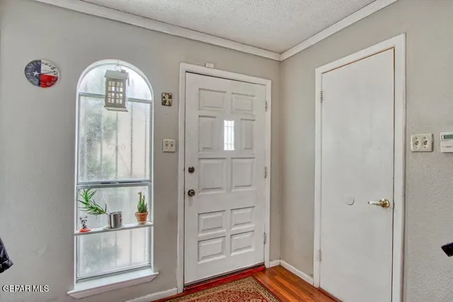 view of an entryway with wooden floor