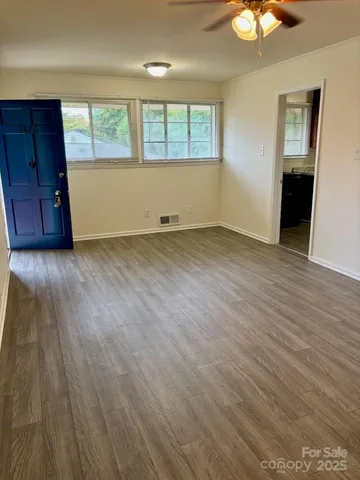 a kitchen with stainless steel appliances granite countertop a stove a sink dishwasher and a refrigerator