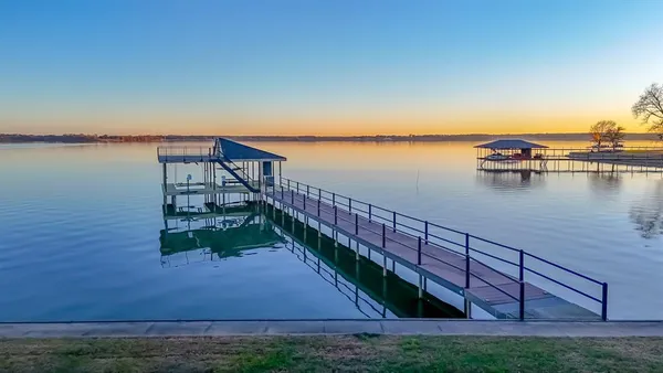 a view of a lake with a outdoor space