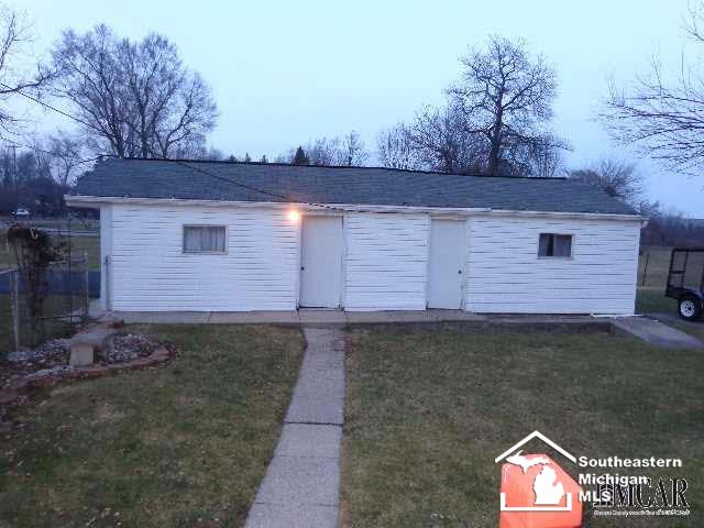 8328 Crabb Road Temperance, MI 48182 - Photo 5 of 9 garage w/rear worshop