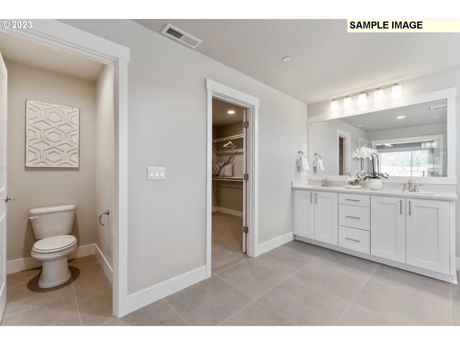 5597 North 94th Avenue, Unit LT246 Camas, WA 98607 - Photo 27 of 32 a bathroom with a toilet sink and a vanity