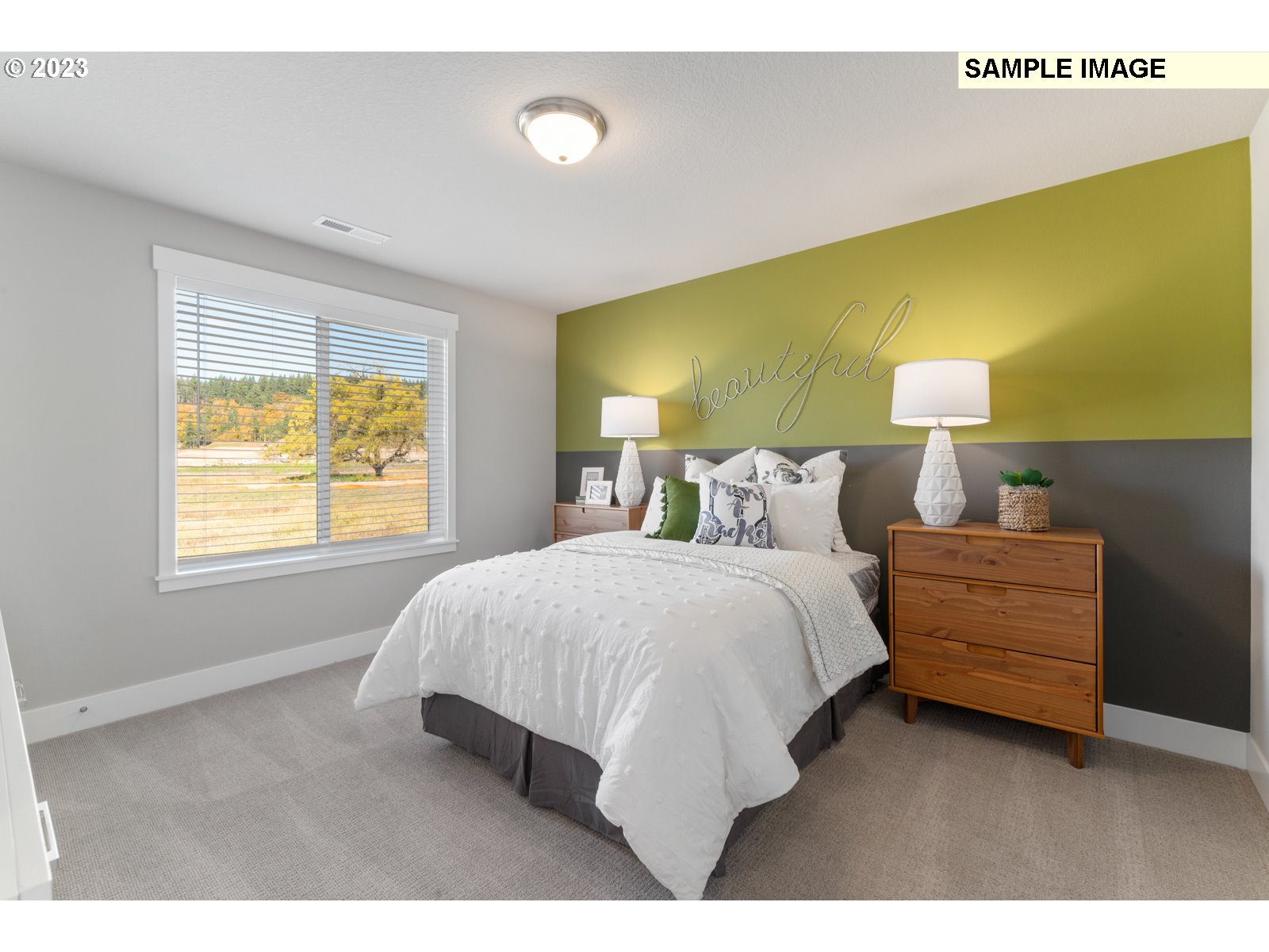 5597 North 94th Avenue, Unit LT246 Camas, WA 98607 - Photo 28 of 32 a bedroom with a bed and lamps