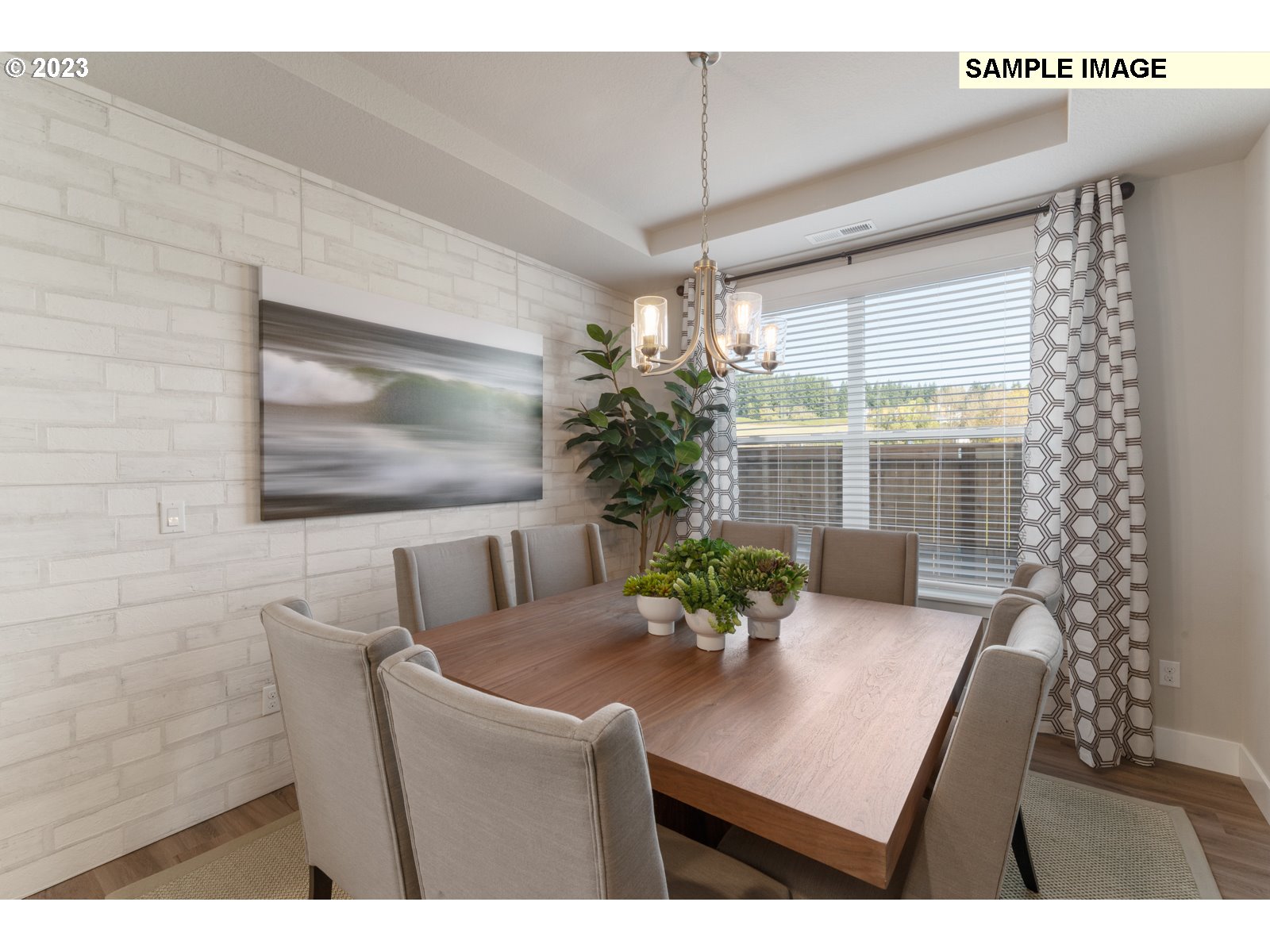 5597 North 94th Avenue, Unit LT246 Camas, WA 98607 - Photo 5 of 32 a view of a dining room with furniture and a potted plant