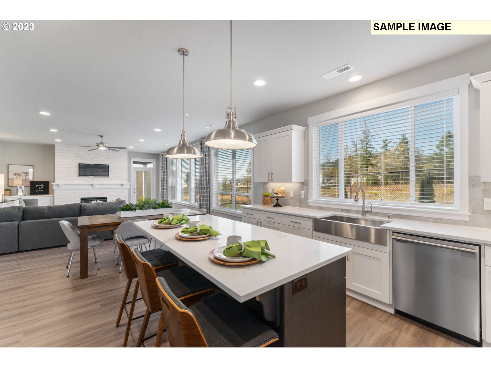 5597 North 94th Avenue, Unit LT246 Camas, WA 98607 - Photo 9 of 32 a kitchen with a dining table chairs and view living room