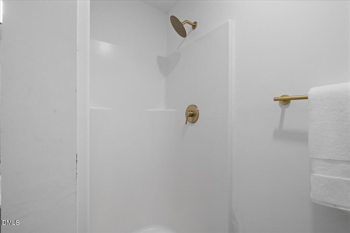 809 Felicia Street Durham, NC 27704 - Photo 24 of 31 a bathroom with a shower