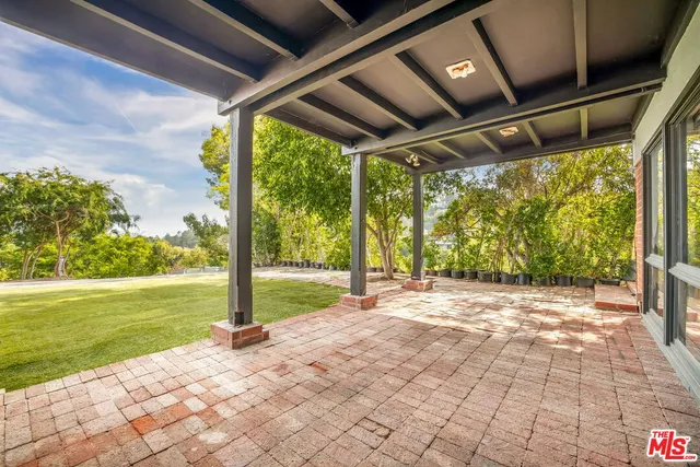 a view of a porch with a big yard