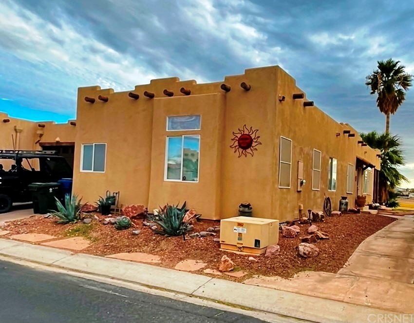 a view of a house with a patio