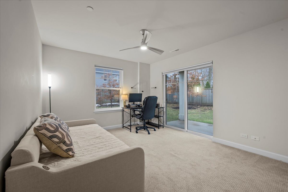 834 Chestnut Street Deerfield, IL 60015 - Photo 14 of 22 a work room with furniture and a chandelier