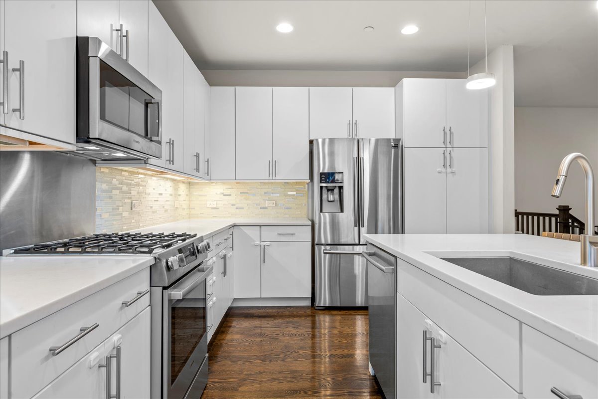 834 Chestnut Street Deerfield, IL 60015 - Photo 5 of 22 a kitchen with stainless steel appliances granite countertop a refrigerator sink and stove