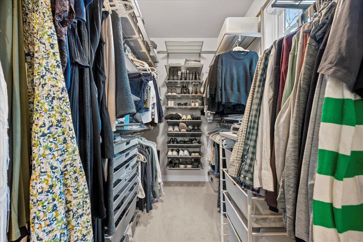 834 Chestnut Street Deerfield, IL 60015 - Photo 9 of 22 a view of walk in closet with clothes and shoes