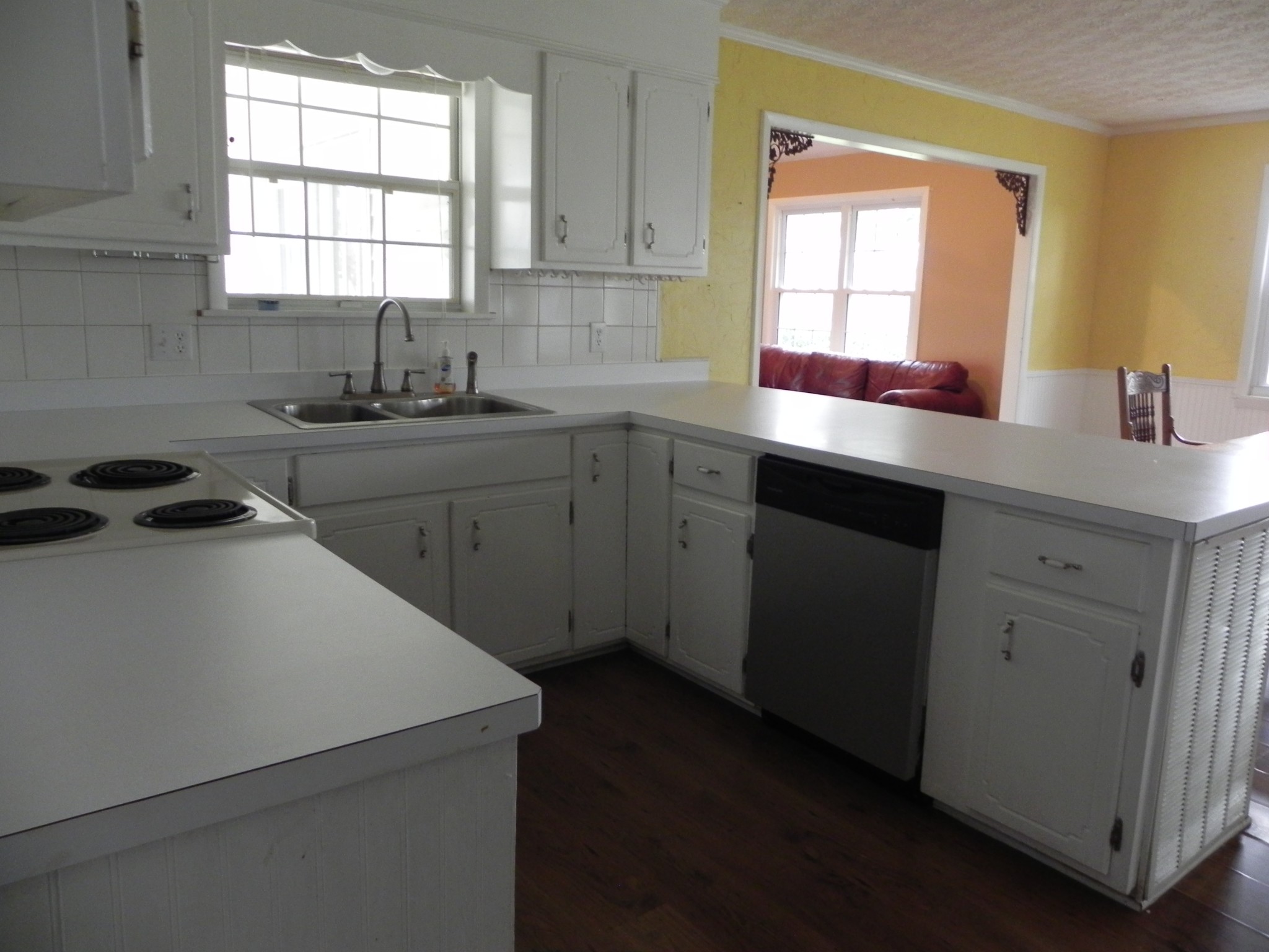 444 Nixon Road Red Boiling Springs, TN 37150 - Photo 12 of 41 a kitchen with sink cabinets and window