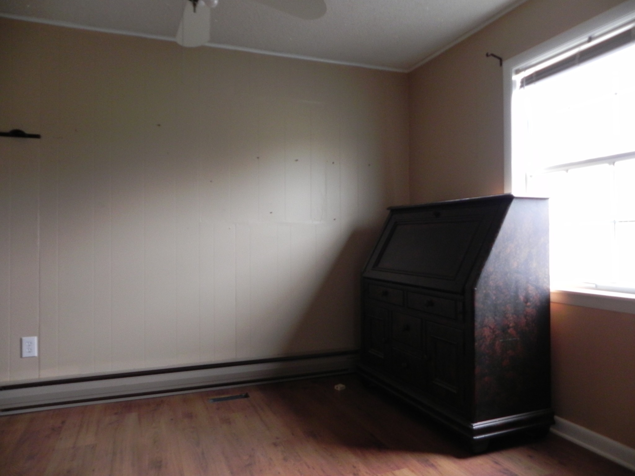 444 Nixon Road Red Boiling Springs, TN 37150 - Photo 17 of 41 an empty room with wooden floor and windows
