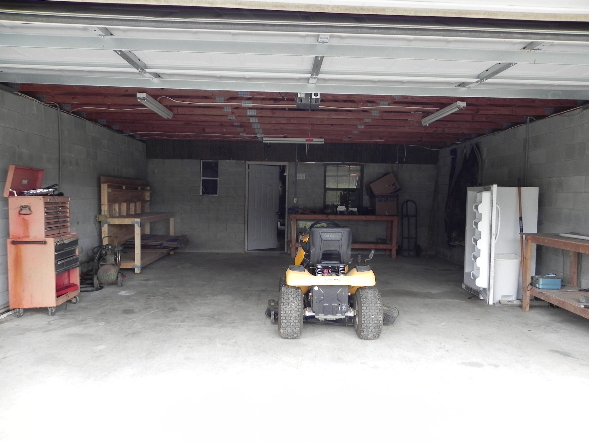 444 Nixon Road Red Boiling Springs, TN 37150 - Photo 35 of 41 a room with wooden furniture and storage