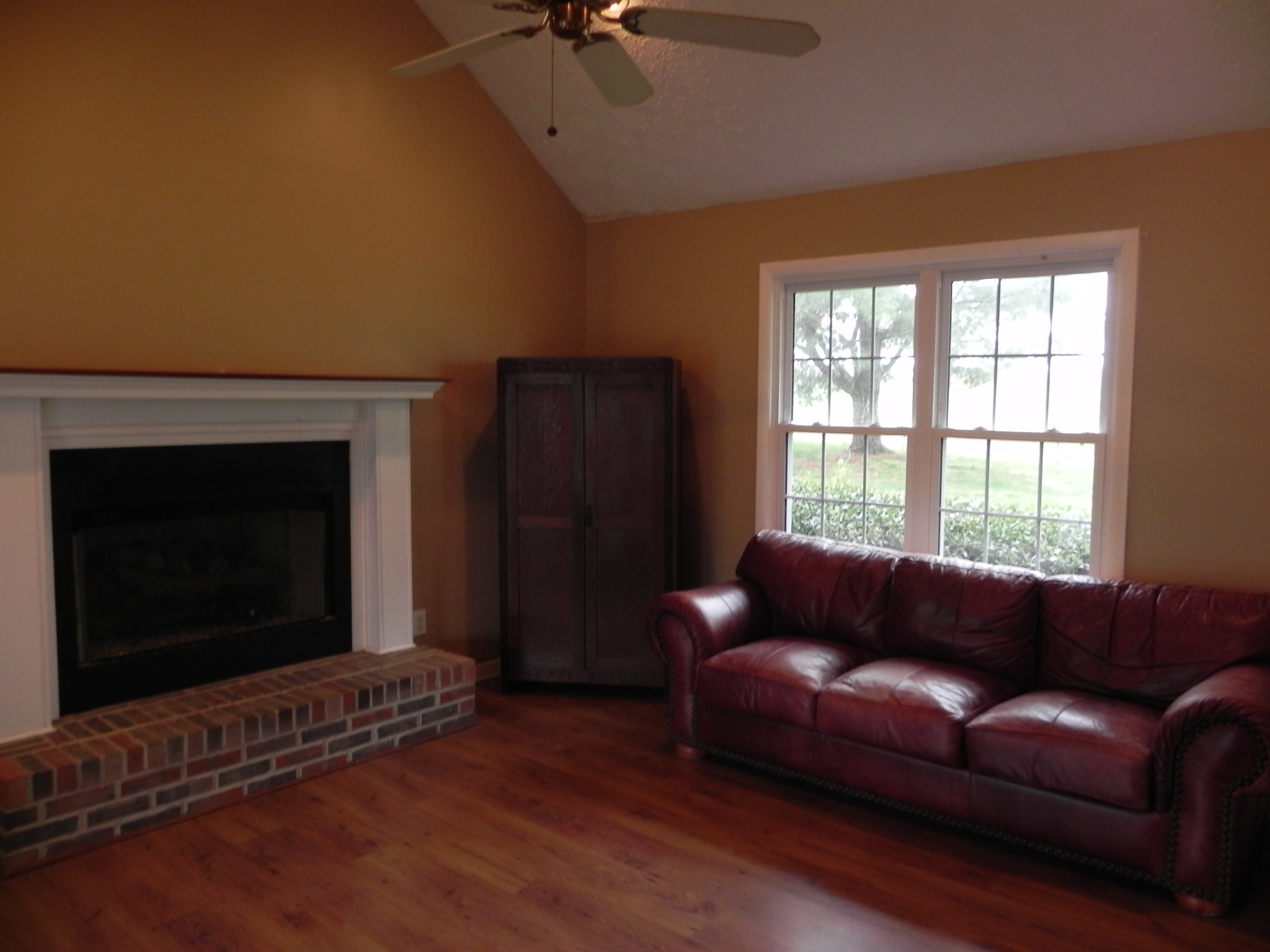 444 Nixon Road Red Boiling Springs, TN 37150 - Photo 4 of 41 a living room with furniture and a fireplace