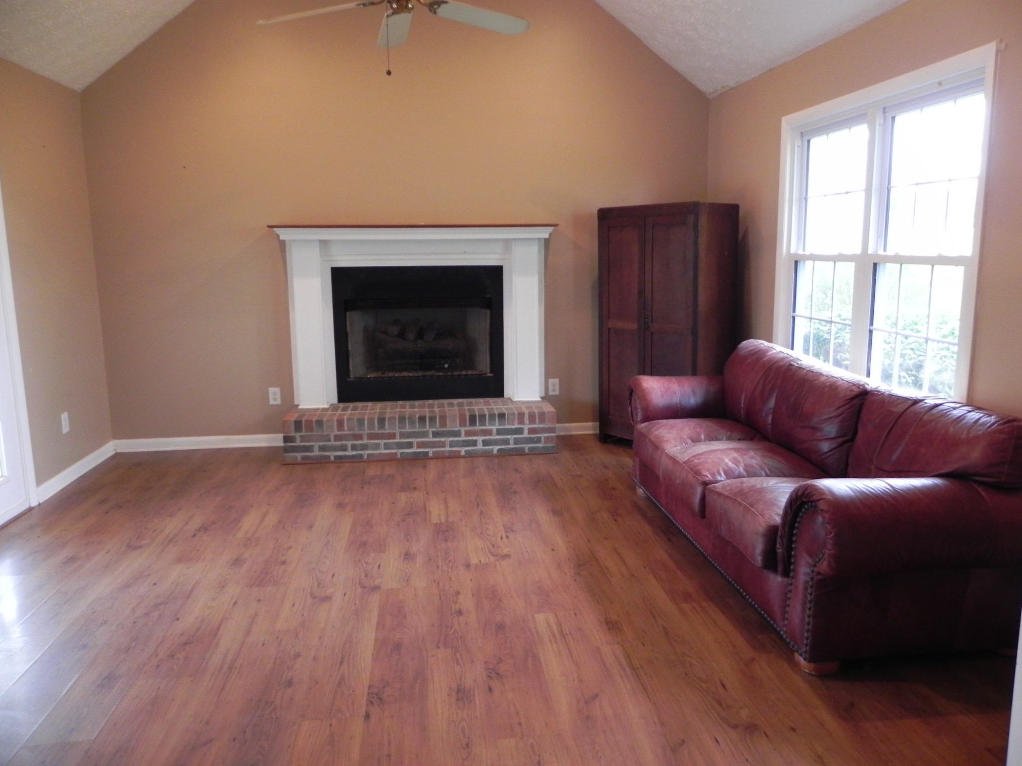 444 Nixon Road Red Boiling Springs, TN 37150 - Photo 5 of 41 a living room with furniture and a fireplace