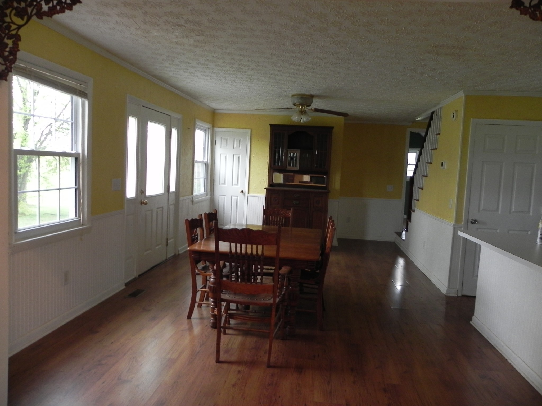 444 Nixon Road Red Boiling Springs, TN 37150 - Photo 6 of 41 a view of a dining room with furniture and wooden floor