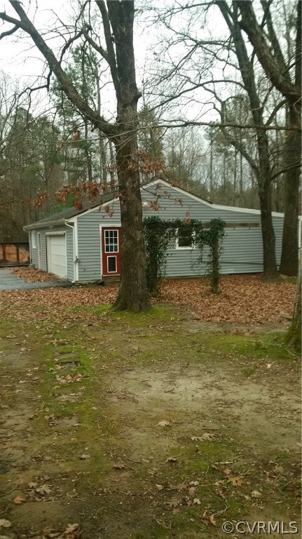 8517 Beach Road Chesterfield, VA 23838 - Photo 13 of 17 view of a house with a tree