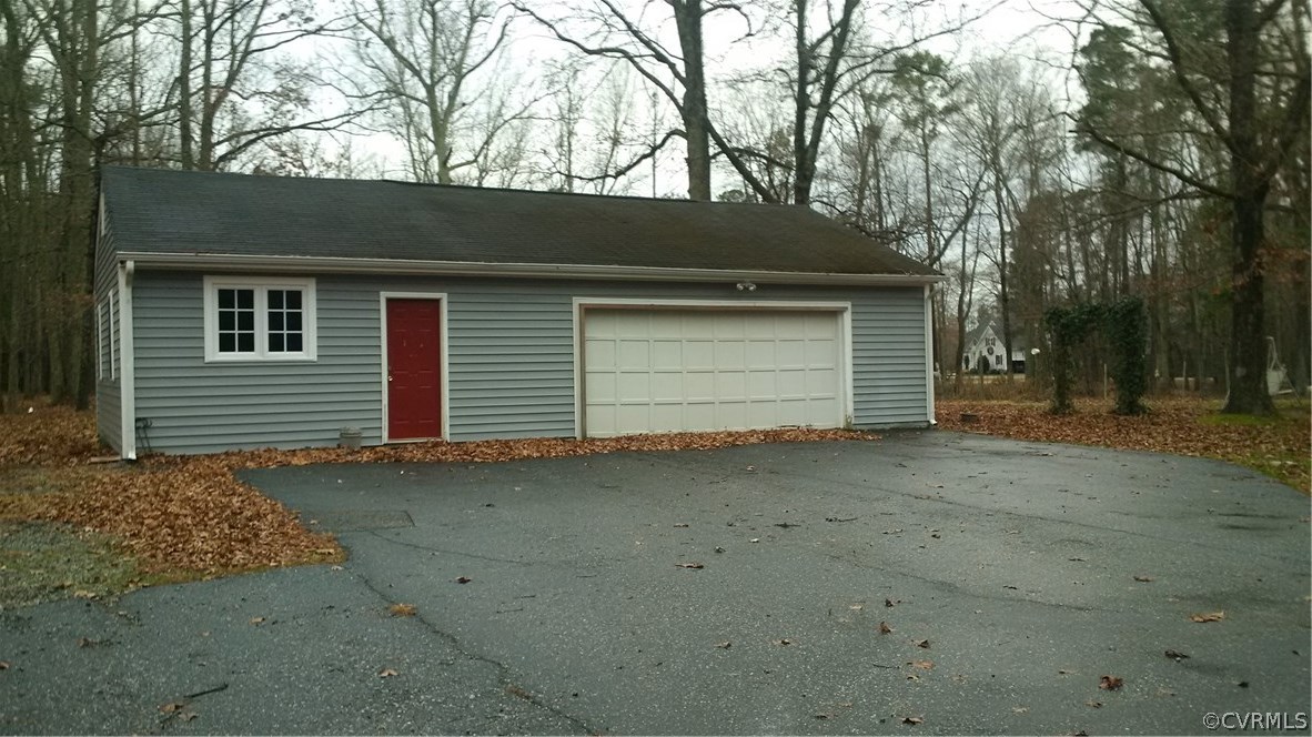 8517 Beach Road Chesterfield, VA 23838 - Photo 14 of 17 a view of backyard of house