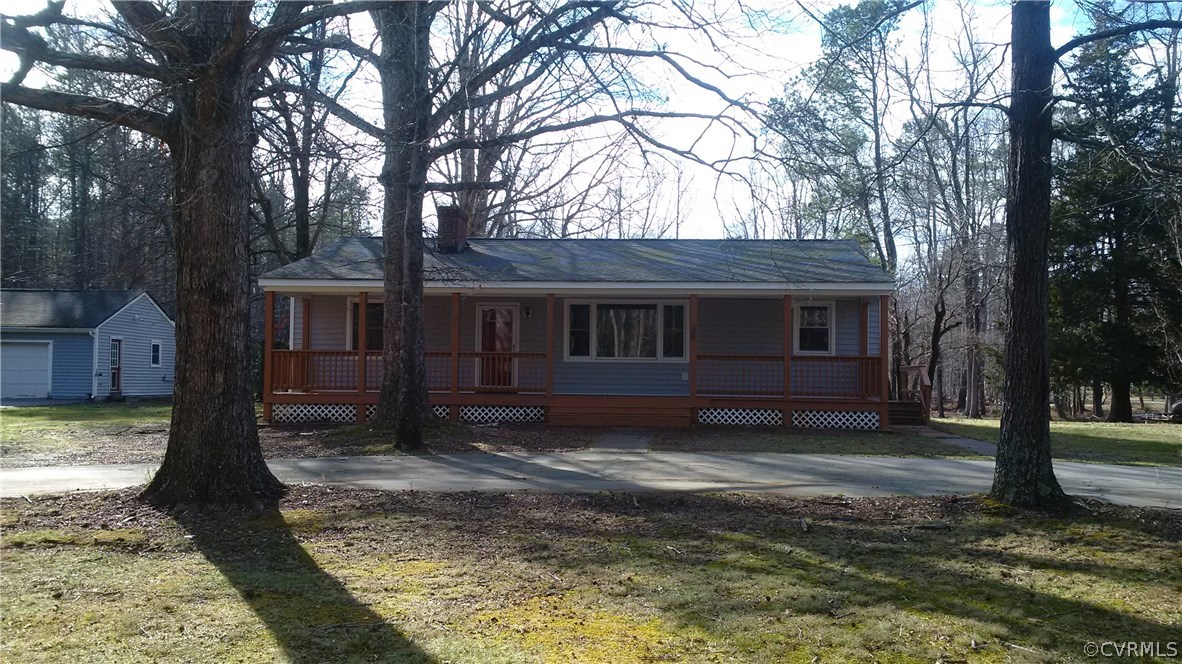 8517 Beach Road Chesterfield, VA 23838 - Photo 2 of 17 a view of a house with a yard covered in snow