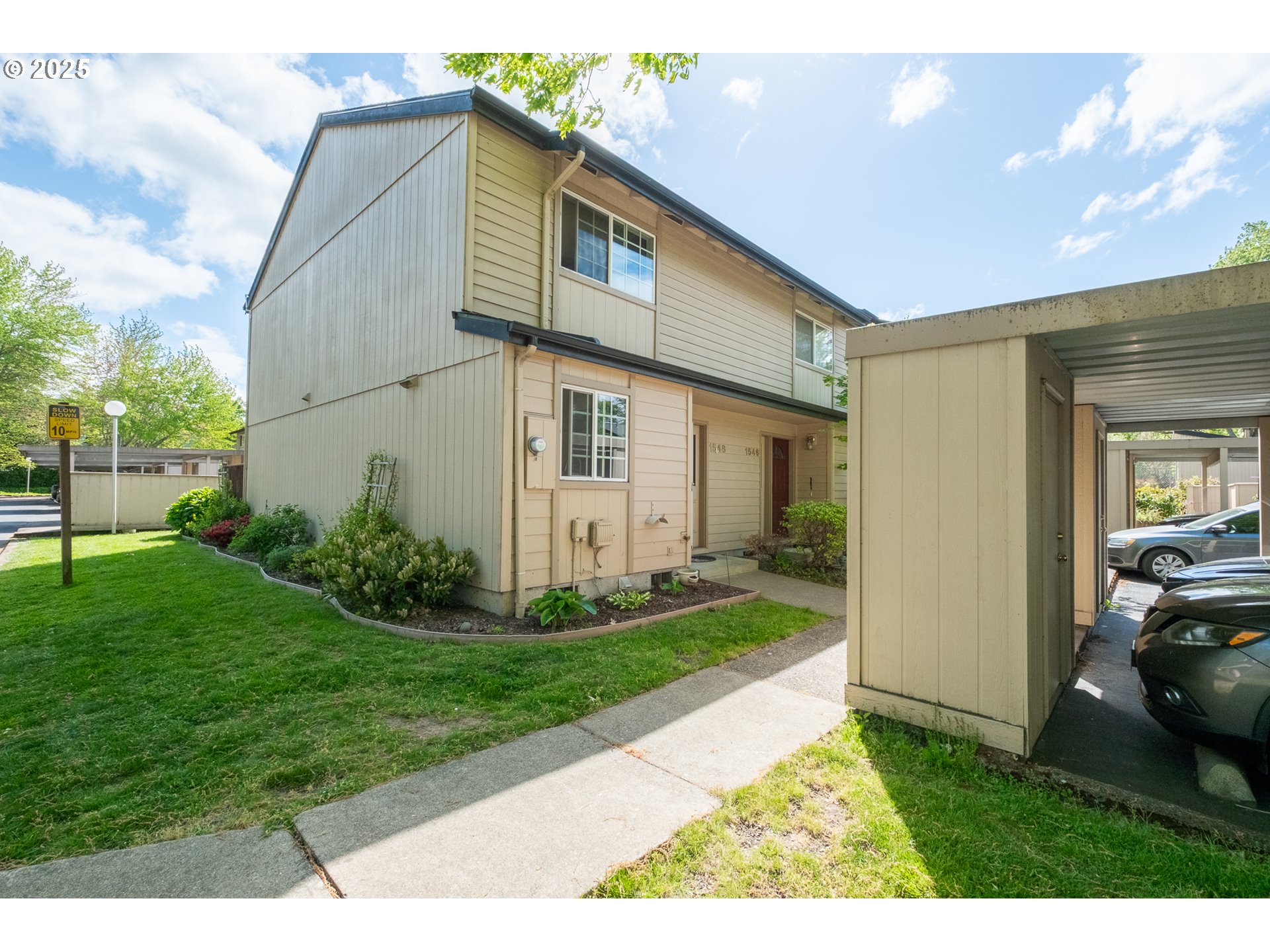 1548 Fetters Loop Eugene, OR 97402 - Photo 1 of 33 a front view of a house with garden
