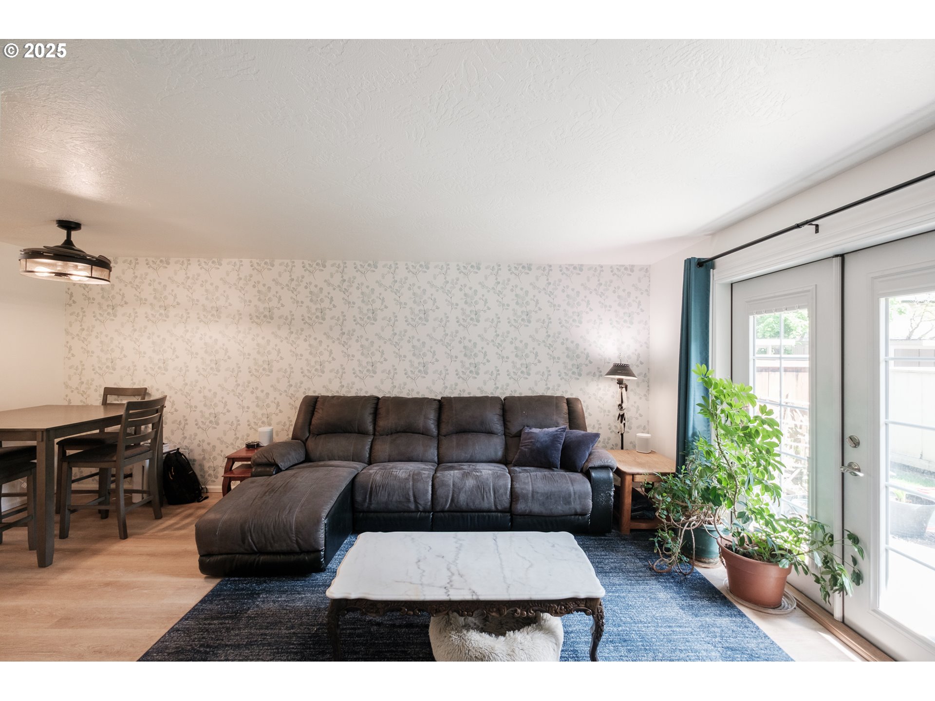 1548 Fetters Loop Eugene, OR 97402 - Photo 11 of 33 a living room with furniture and wooden floor