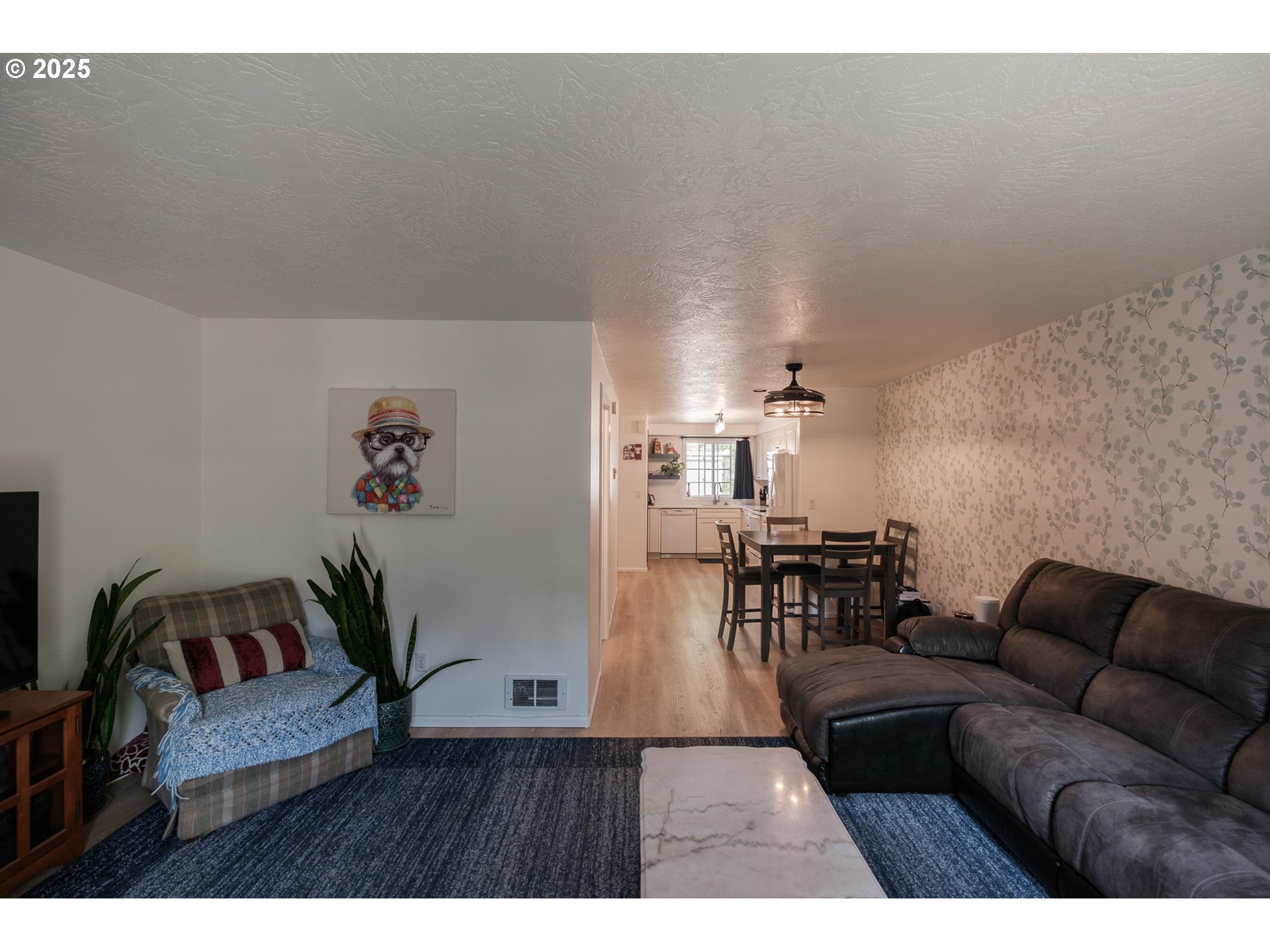 1548 Fetters Loop Eugene, OR 97402 - Photo 12 of 33 a living room with furniture and wooden floor